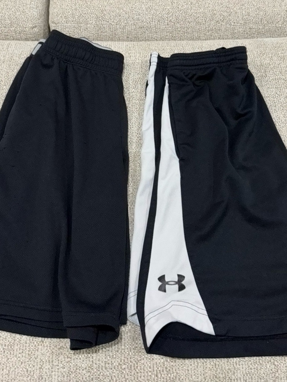2 Medium Under Armour Men’s Black Athletic Shorts both pairs 1 price